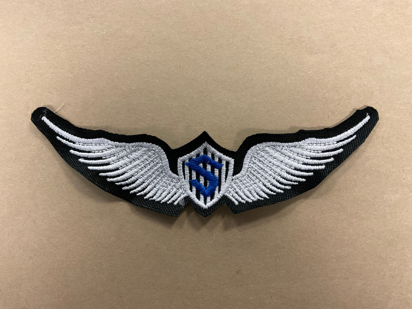 
                  
                    Embroidered Solo Wings
                  
                