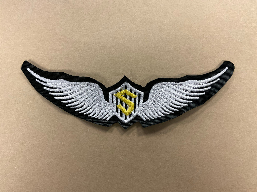 
                  
                    Embroidered Solo Wings
                  
                