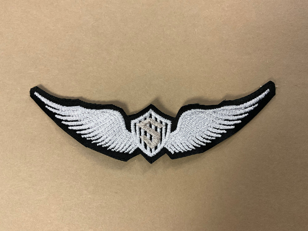 
                  
                    Embroidered Solo Wings
                  
                