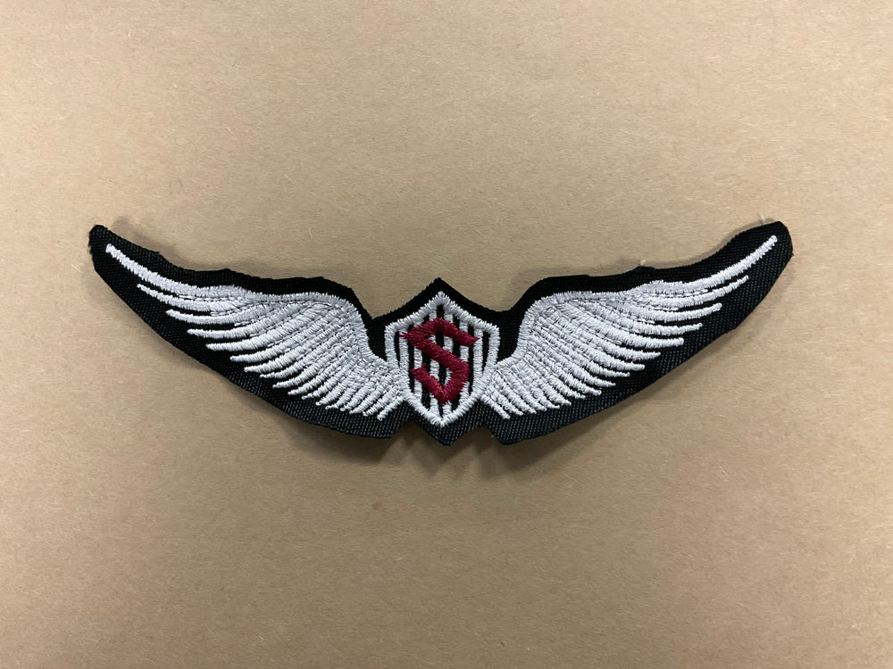 
                  
                    Embroidered Solo Wings
                  
                