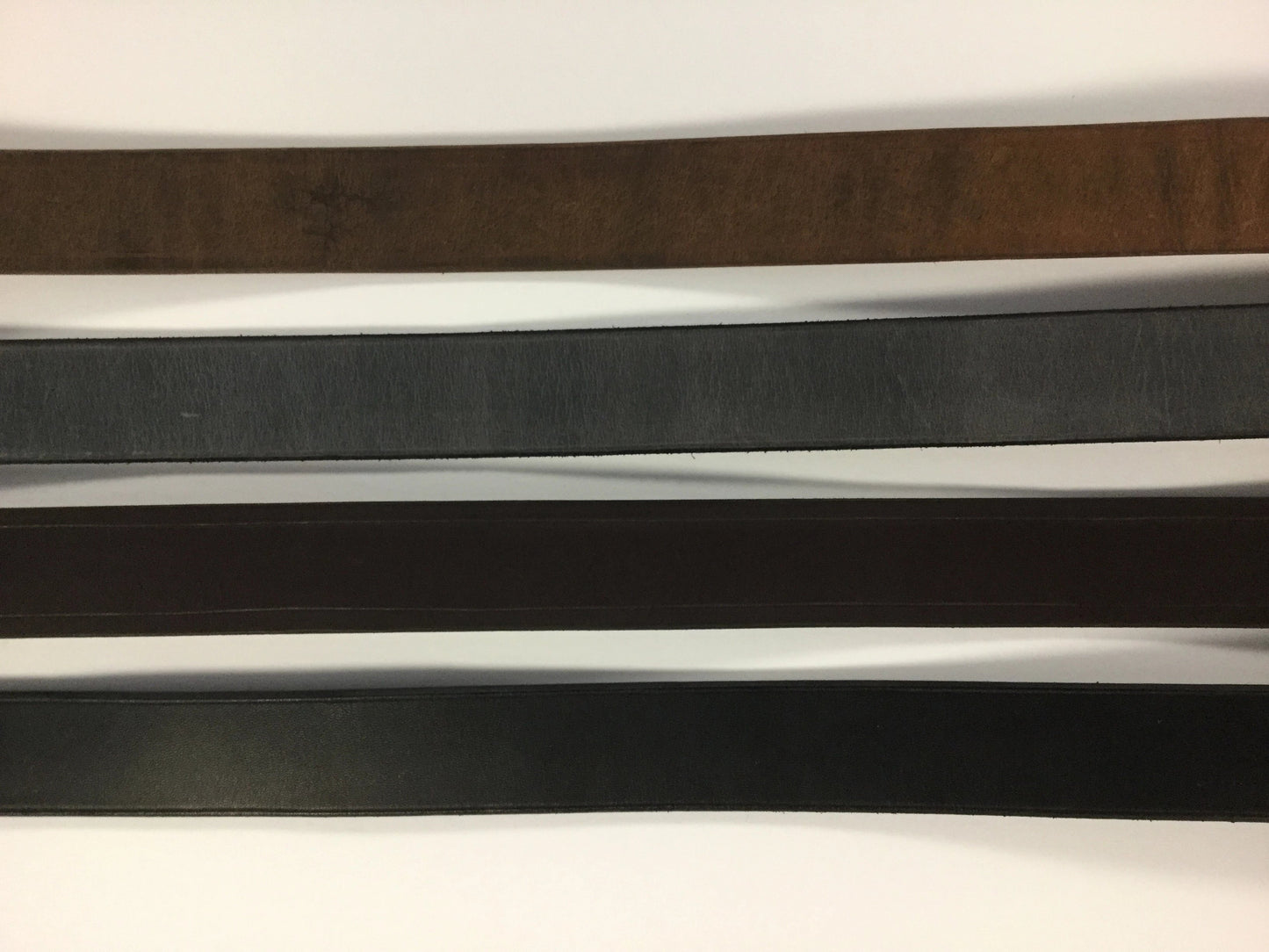 Top to Bottom:  Water Buffalo Brown, Water Buffalo Gray, Brown Leather, Black Leather